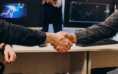 Professionals shaking hands, symbolizing successful digital partnerships, STL Digital.