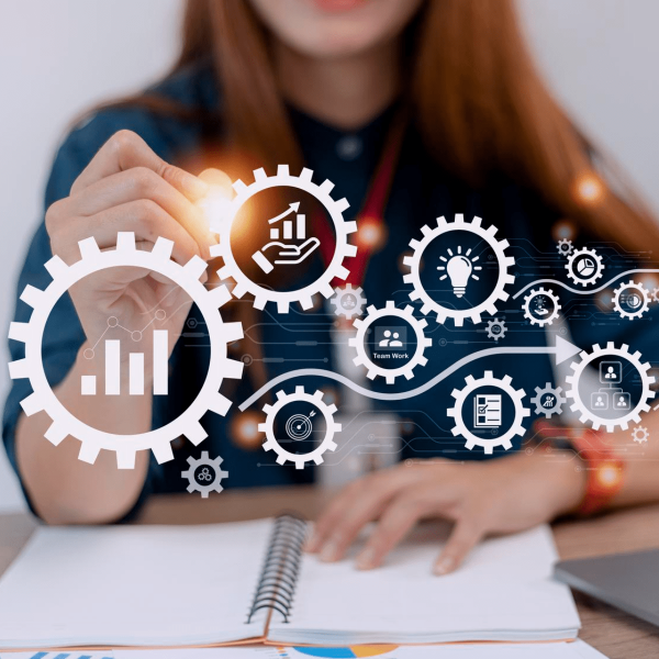 Gears and icons illustrating STL Digital's product engineering services and innovation.
